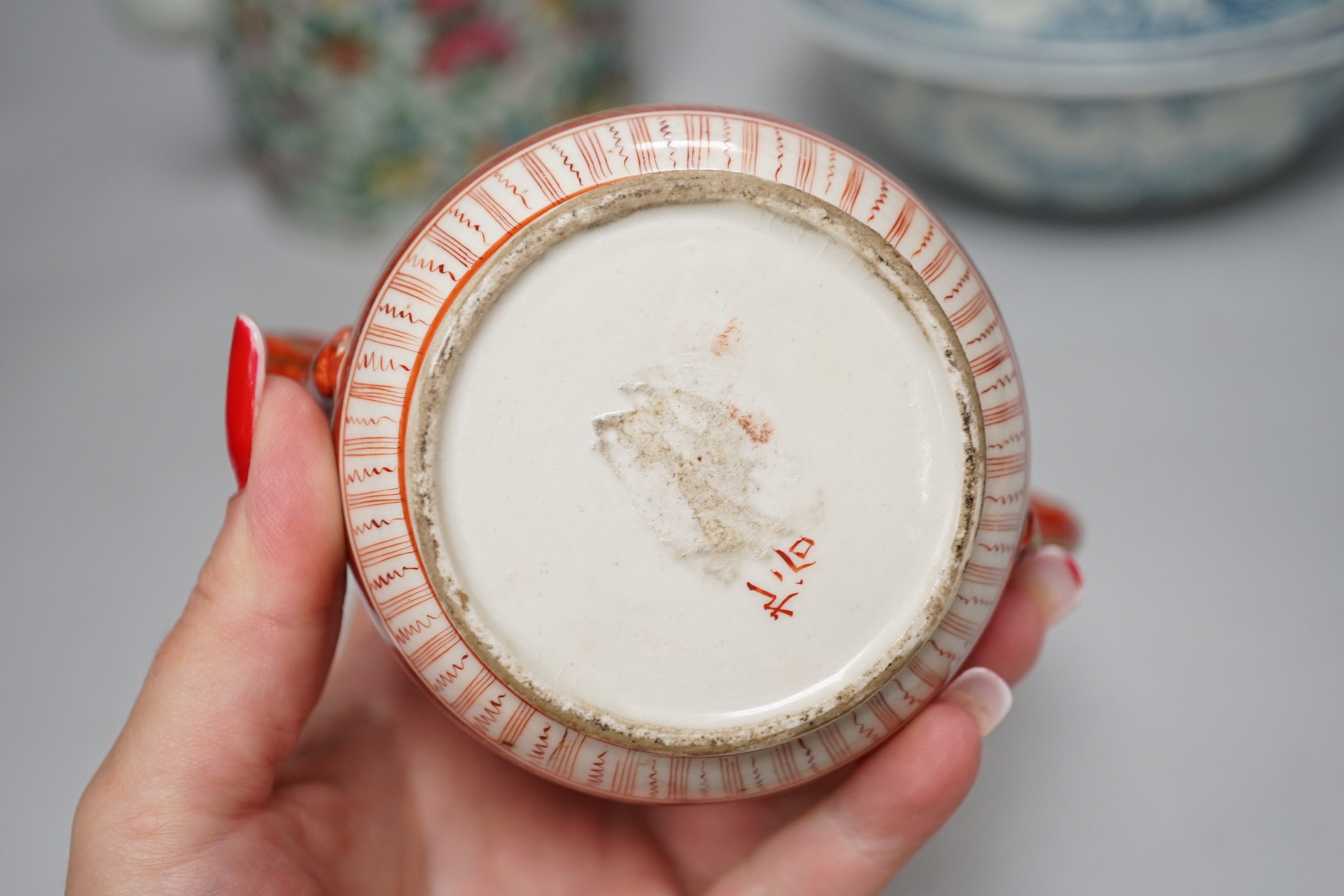 Assorted Chinese and Japanese ceramics including a Kutani jar and cover and a floral teapot, the largest 15cm high